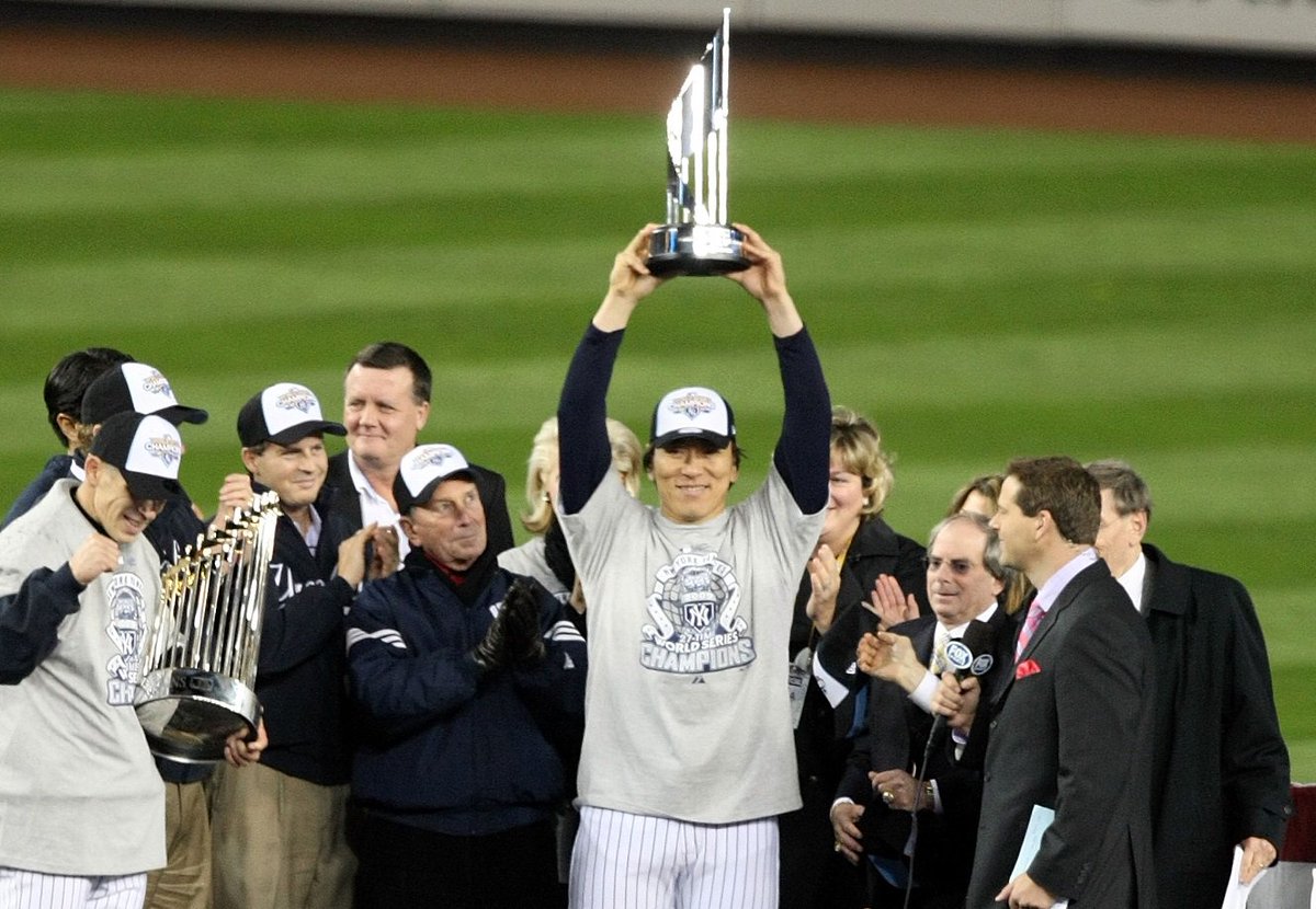 World Series MVP Hideki Matsui celebrating with the trophy